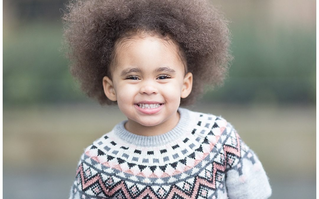 family photographer edinburgh, smiling girl with afro hair professional photography by beautiful bairns photography Edinburgh