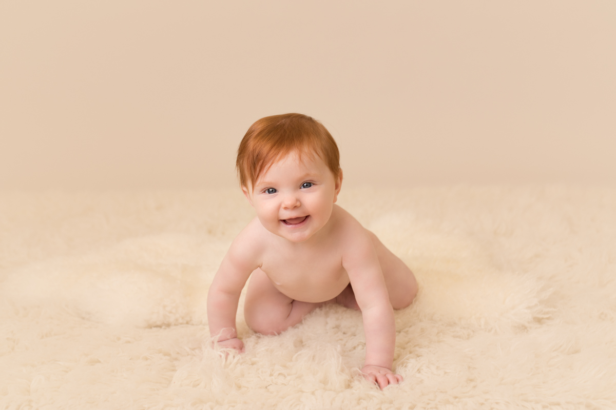 photo of red haired baby girl by professional baby photographer beautiful bairns photography edinburgh