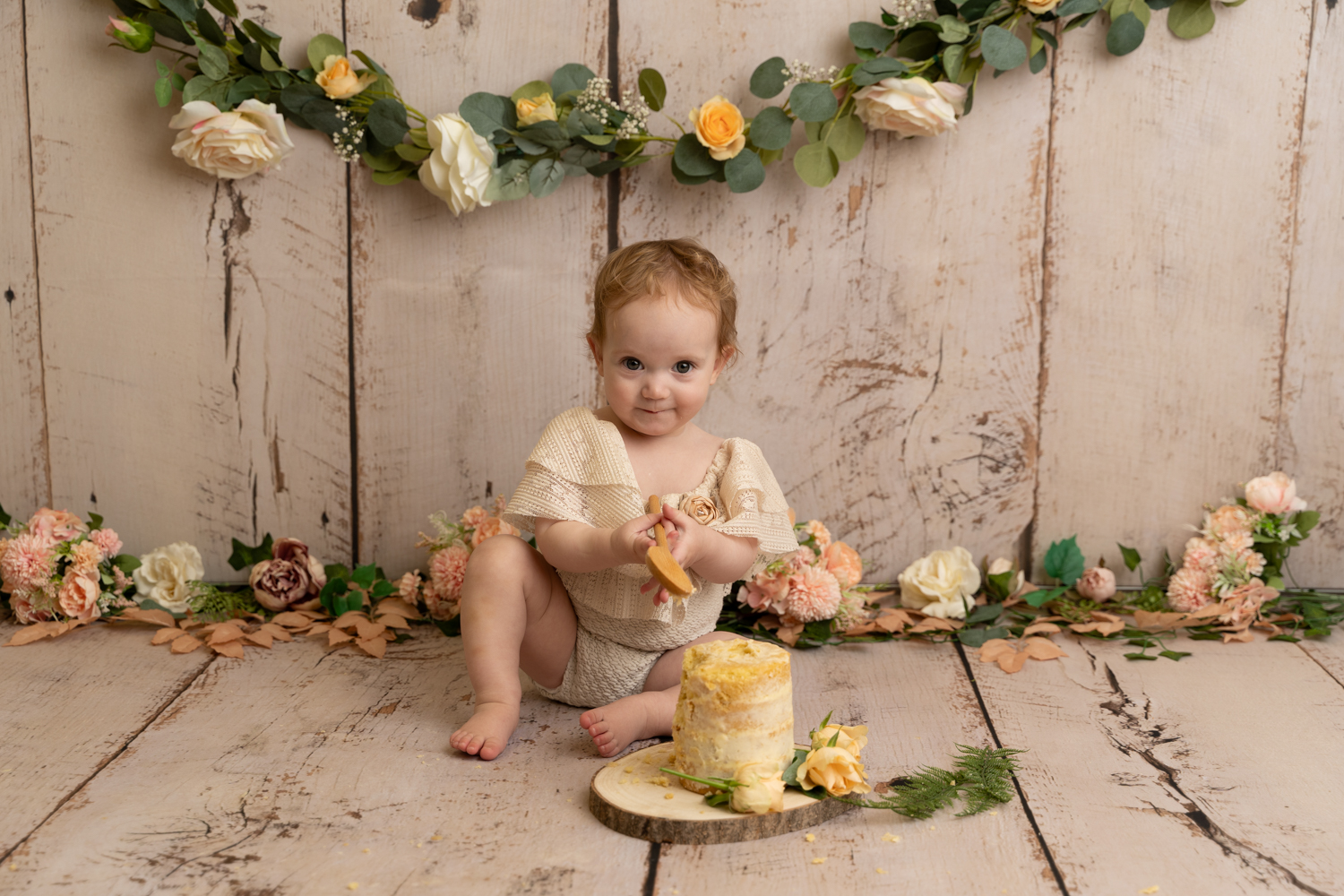 cake smash photoshoot with floral boho theme in edinburgh